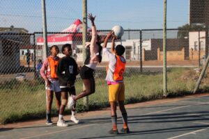 Girls having fun on the netball court