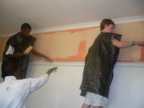 Getting their hands dirty renovating the kitchen
