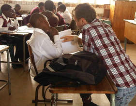 volunteers assist with academics