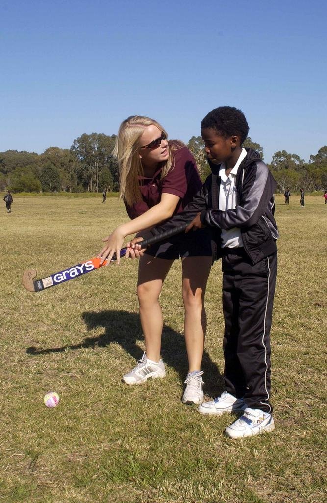 Coach Kate works with Xolelwa on her technique