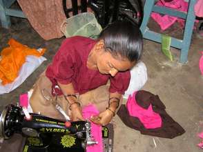 lower limb paralysed girl with her sewing machine