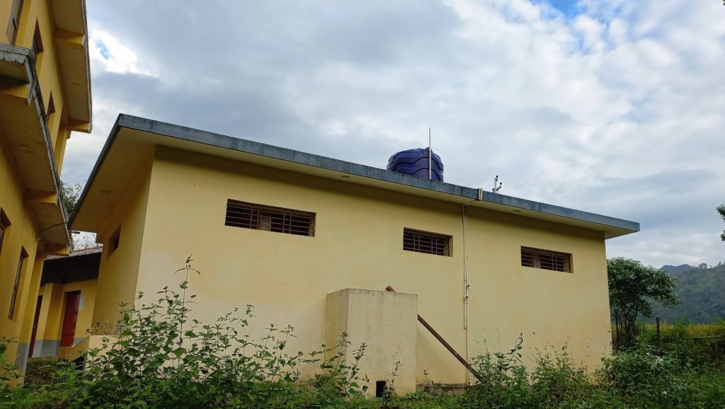 Back View of the Toilet with the Incinerator.