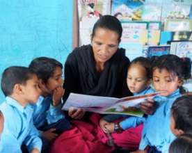 A teacher reads aloud at Shree Bihebar School.