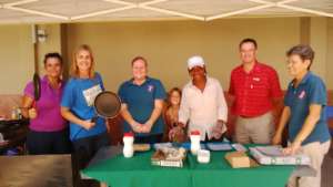 Staff selling pancakes to raise funds at Spar