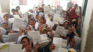 Girls are happy to have IEC Material in local lang