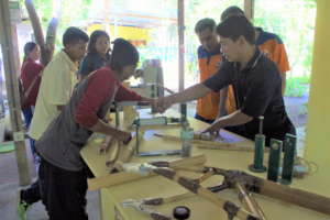 Our craftsmen demonstrating bike building process