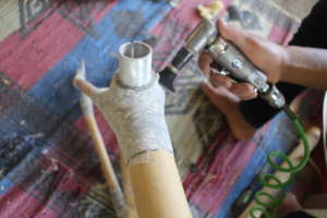 Removing excess epoxy with air sander