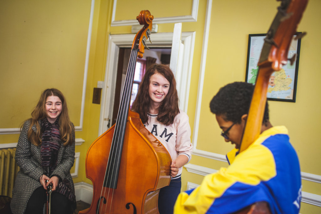 Change the lives of 50 children through music