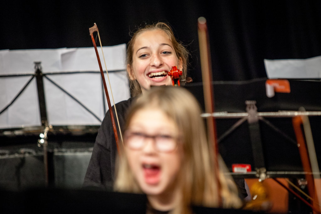 Change the lives of 50 children through music