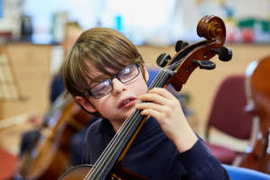 Hana learning the cello