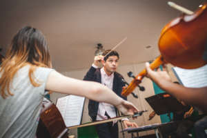 Venezuelan conductor, Felix, with our Teens