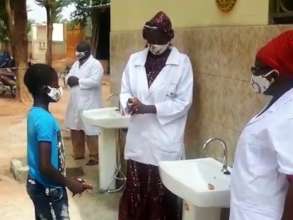 Instructing the street children about hand washing