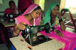 A woman learns vocational education of sewing