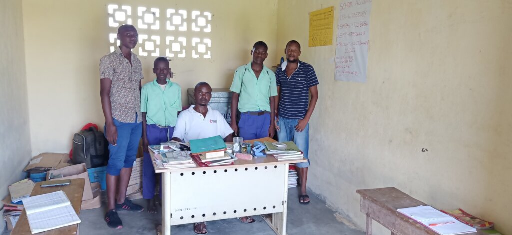 Kibokoni Primary Headteacher and students