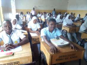 Minhaj Students listening during the briefing