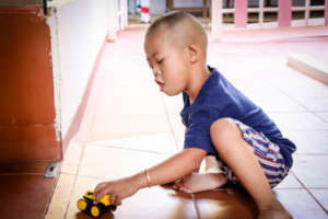 Growing Class Student Playing