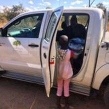 HIV+ child receiving support at roadside clinic