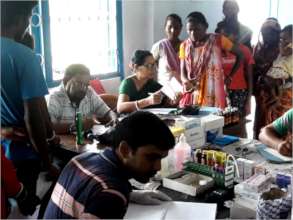 Crowd at the Doctor's Table