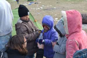 Children Receiving Fresh Drinking Water