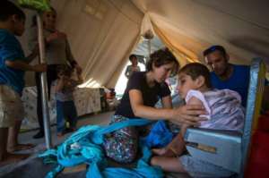 Holistic Support for Refugees Arriving in Greece