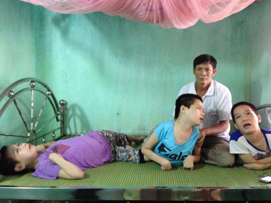 Mr Duc cares for his three paralyzed daughters