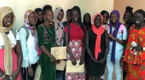 High school students smiling in Sokone, Senegal!