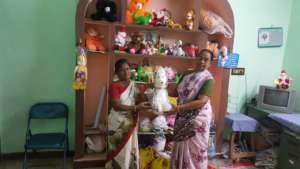 Women making soft toys