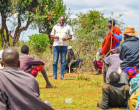 Hilary with herders at the cow camp