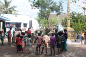 Children playing and learning with interns