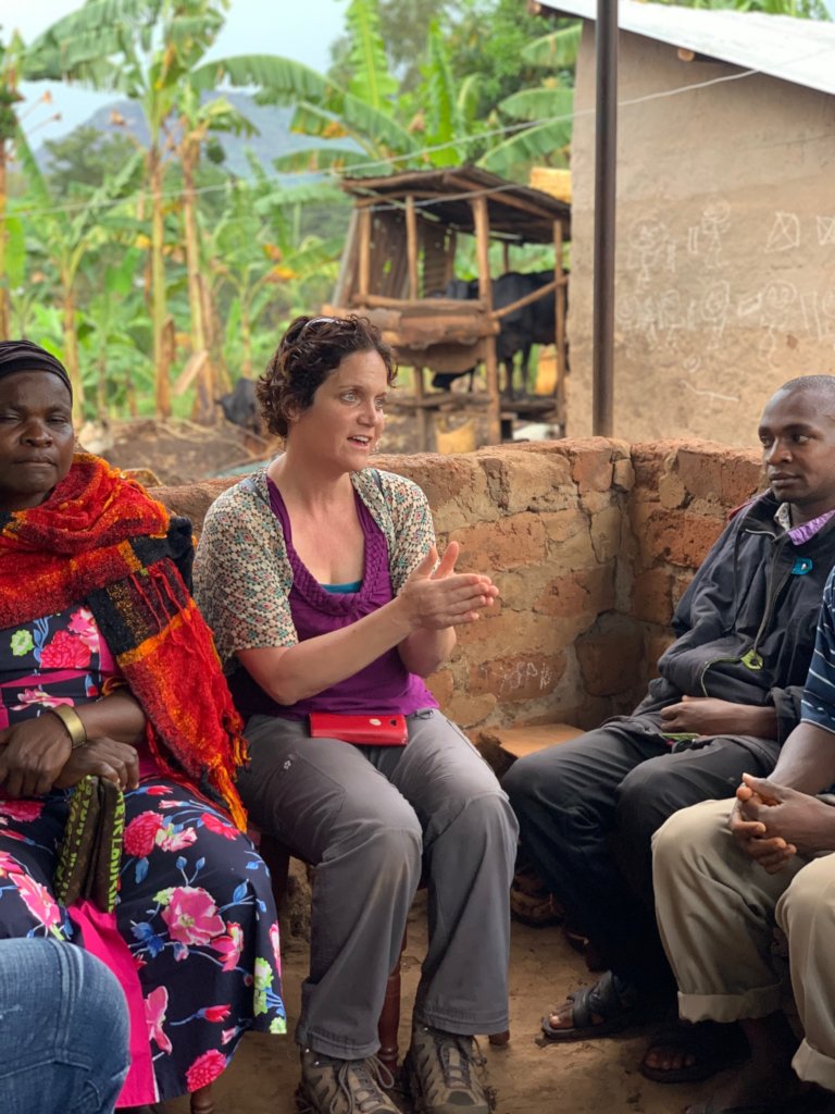 Dir of Programs Brandy Lellou talks with farmers