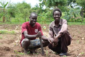 Simon Peter and his son in their Forest Garden