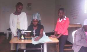 Grace Doing sewing
