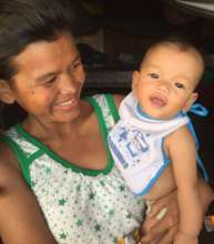 Phalla and her new baby, smiling again