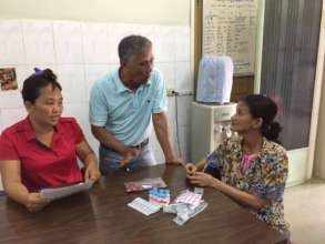 Leung (right) at a weekly support session