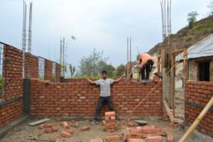 Surya in the field during construction