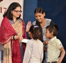 Mrs Sukanya Bharatram presenting scholarships