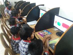 Kids engrossed in Computer Class
