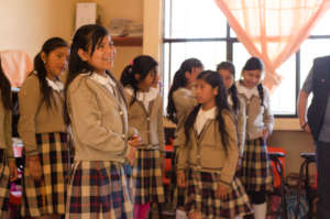 Girls learning in class