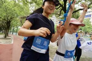 100th activity cross finish line