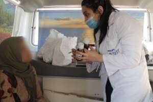 Woman receiving medication