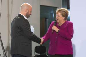 Country Director Gal with Chancellor Merkel