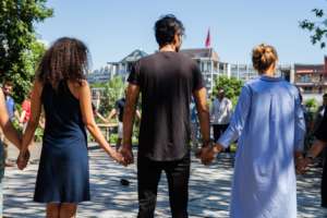 The group participates in a movement activity.