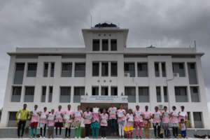 Graduates jumping for joy outside our hospital