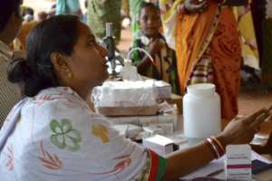 SOVA member working at an Outreach Health Camp