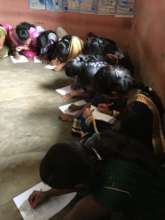 Students in the community take a health survey