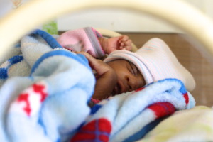 One of Preemies in her incubator.