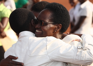 Staff celebrate the arrival of students