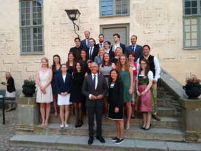 Miss Cansu is with her classmates and professors