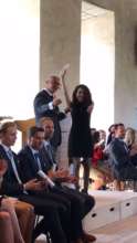 Miss Cansu is getting her diploma from her prof.