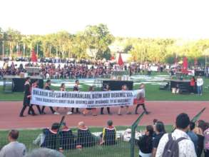 Scholarship holders carried banner during ceremony